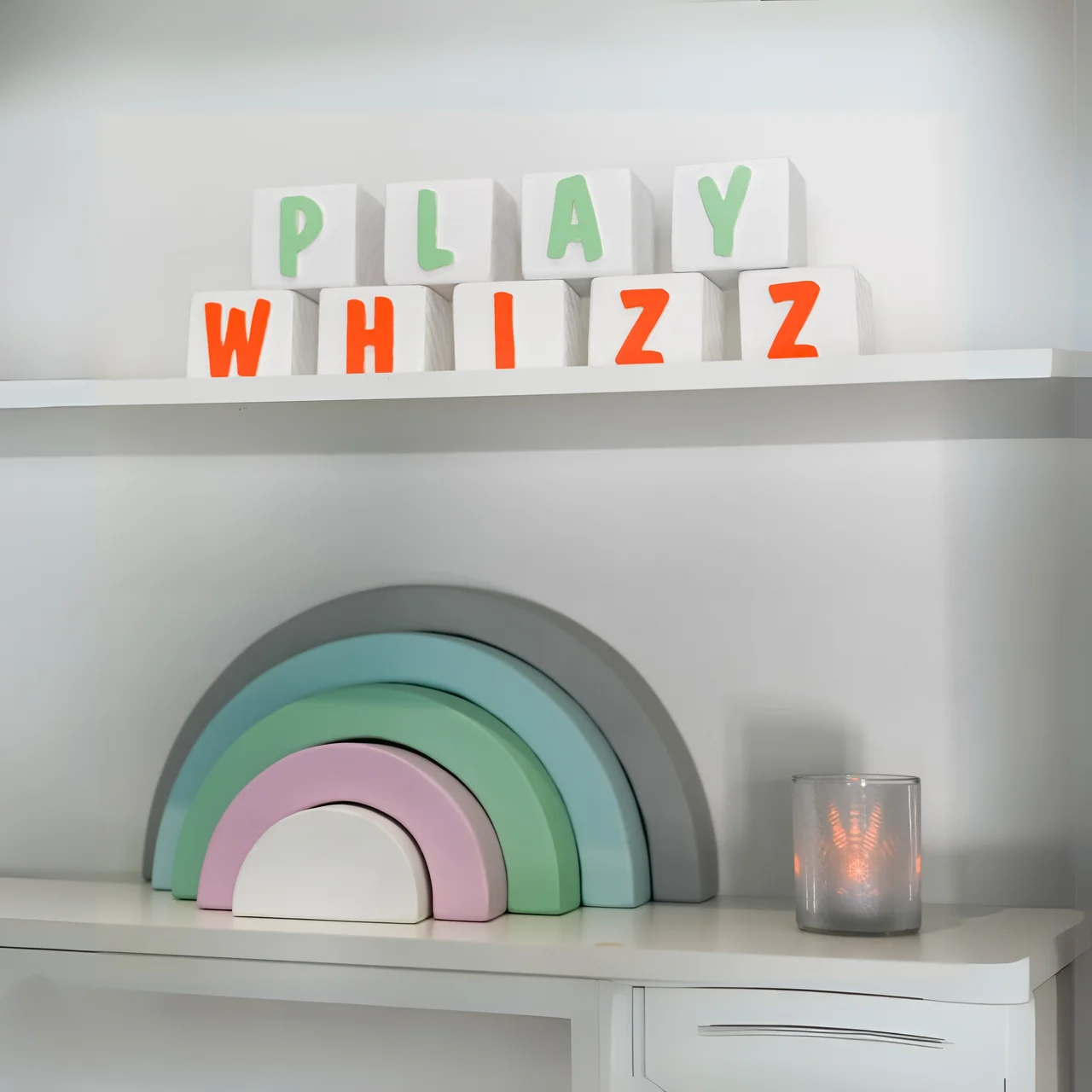 Playwhizz logo written in toy blocks